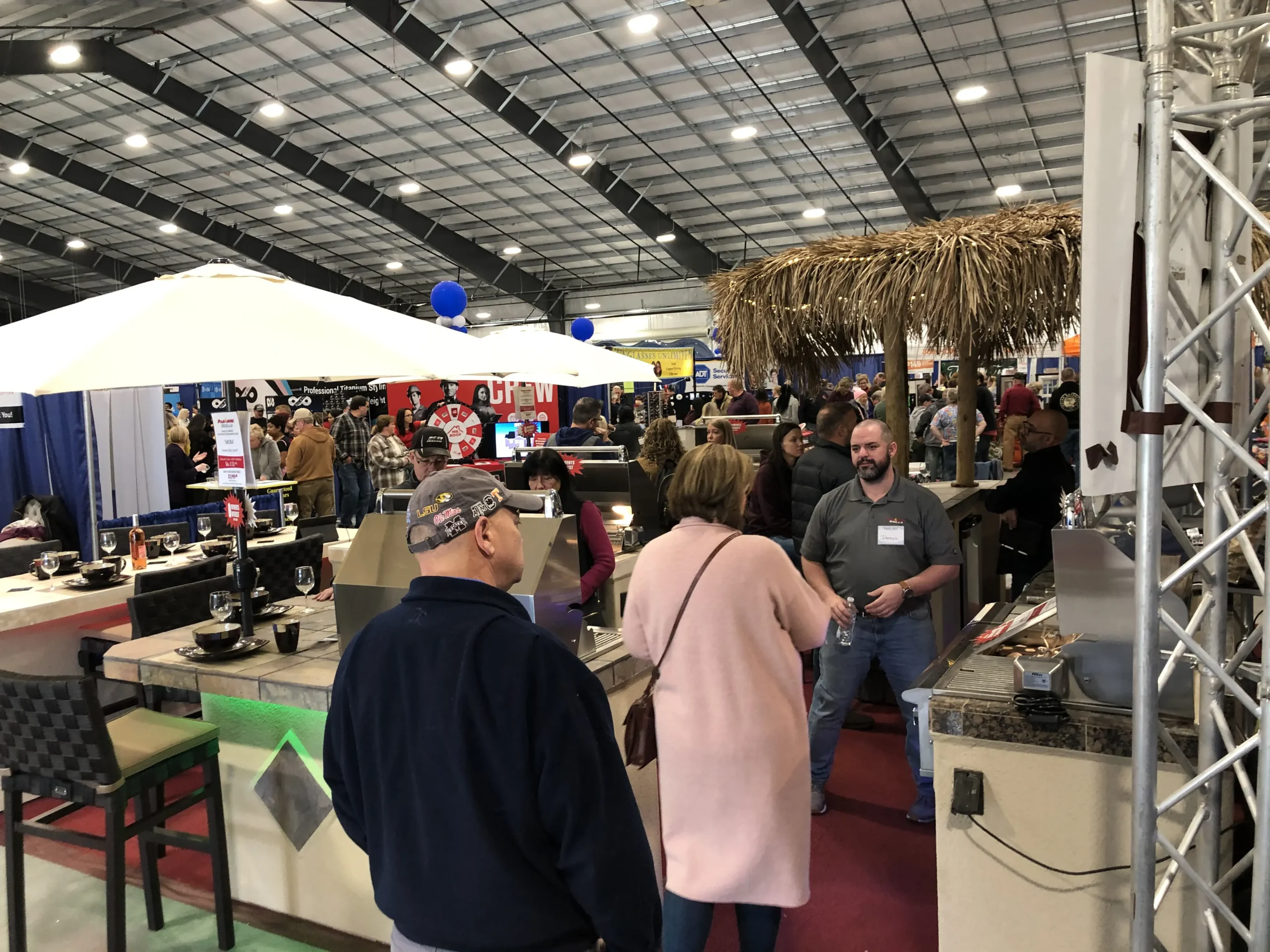 A busy home show floor produced for a regional audience